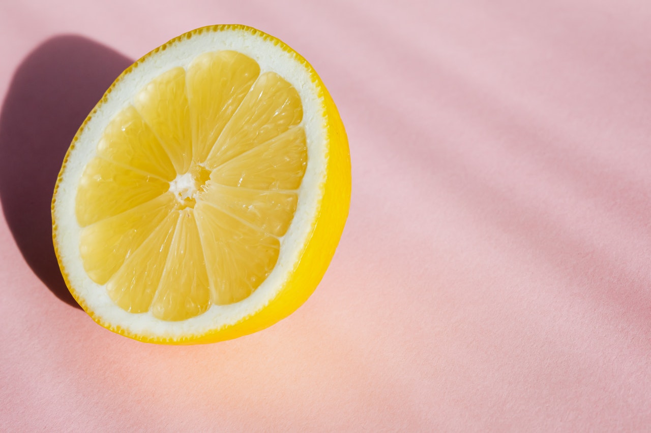 lemon on pink background